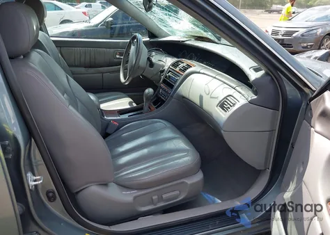 2001 Toyota Avalon Xl/Xls z USA, uszkodzony, nr VIN 4T1BF28B71U118352